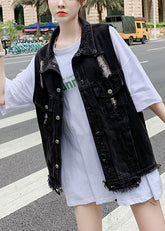Schwarze Patchwork-Jeansweste mit Knöpfen für den Herbst